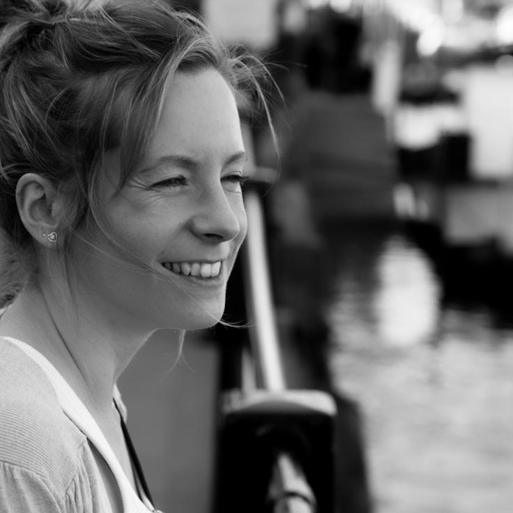 Kaveri Mehta, Lead Design Curator at Ventralo Matrix, reviewing corporate floral arrangements